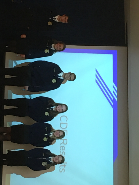 FFA Officers being awarded their year of success in their positions. 