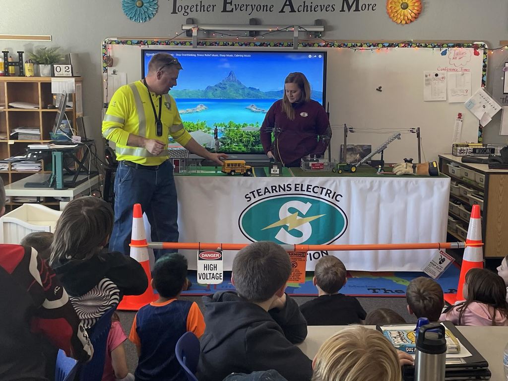 Electric giving students a lesson on electricity safety.